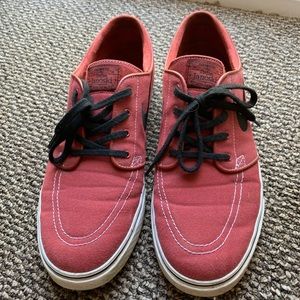 Mens Nike size 11 shoes. Dark orange/red color. Lightly used